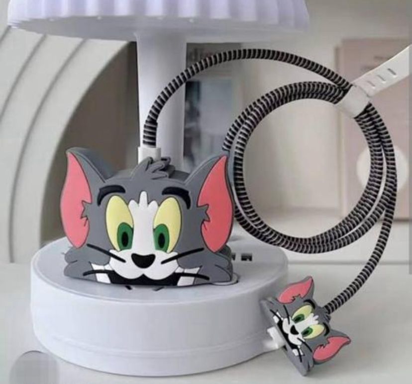 iPhone charger cover tom face cartoon