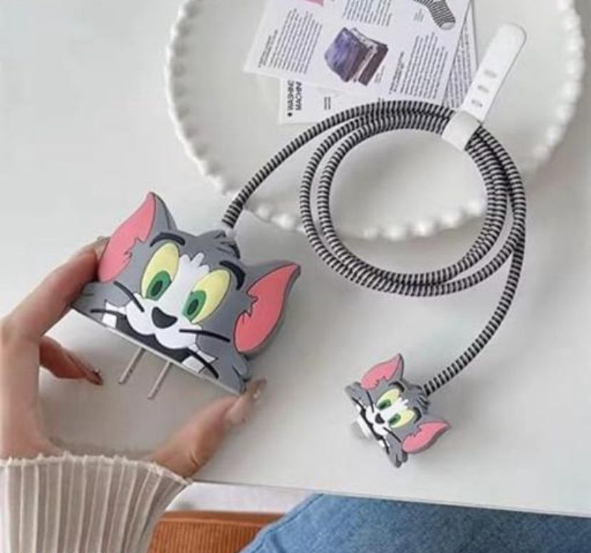 iPhone charger cover tom face cartoon