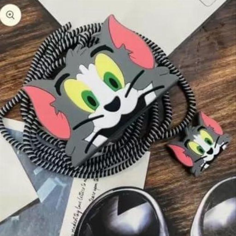 iPhone charger cover tom face cartoon